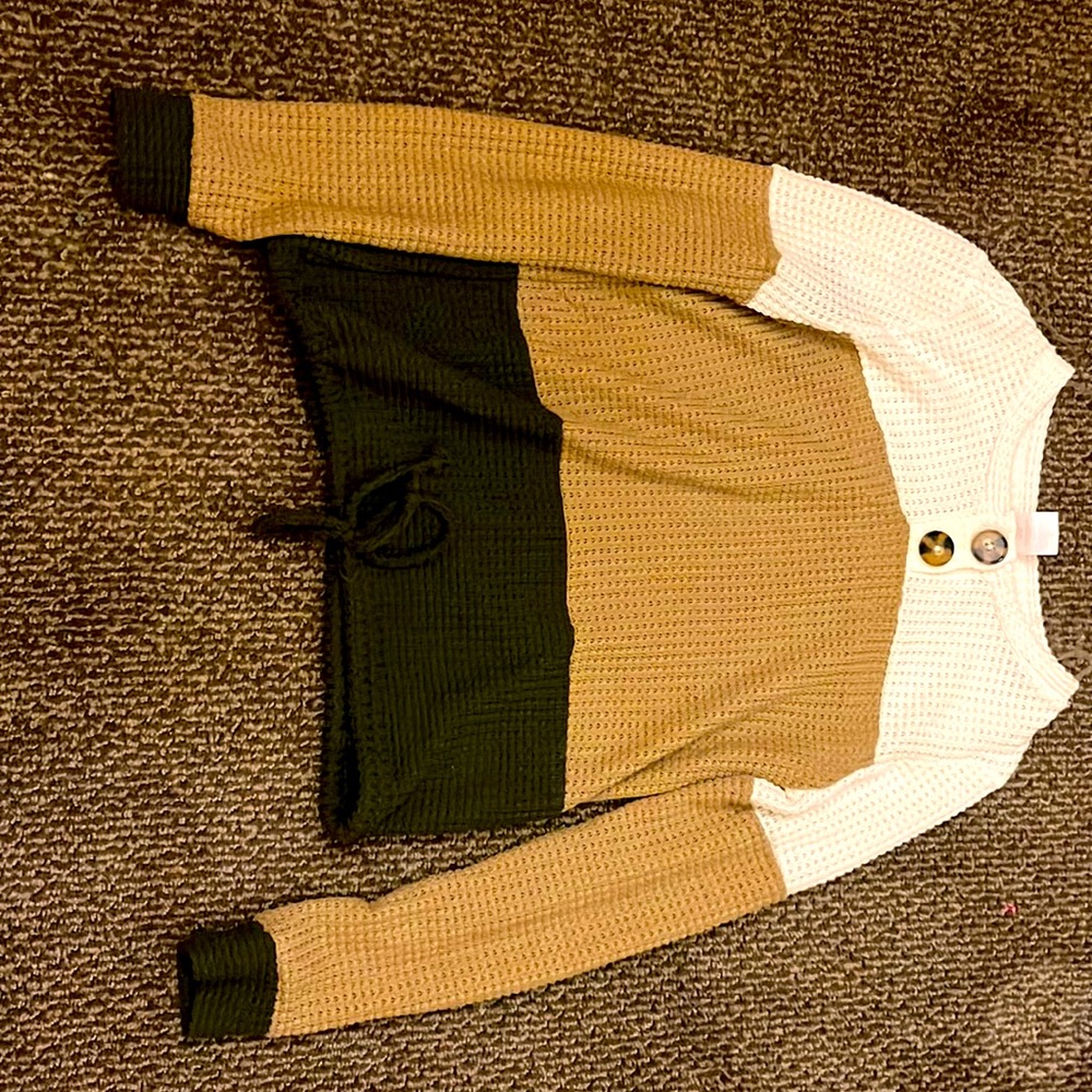 Womens small multicolored sweater.Never been used